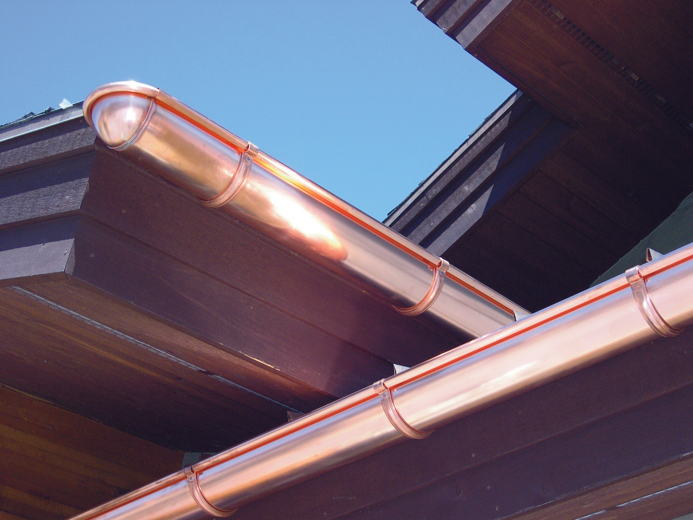 A Rainelements copper half-round eavestrough system